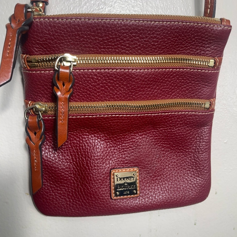 Dooney Bourke  burgundy  grain North South Triple Zip Crossbody (gently loved) - Picture 2 of 8